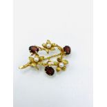 9ct gold floral brooch set with garnets and pearls