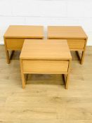 Three oak veneer bedside tables