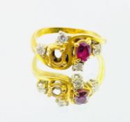 18ct gold serpentine set ruby and diamond ring