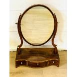 Mahogany veneer oval toilet mirror to three drawers