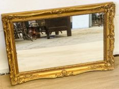 Carved wood gilt frame circular mirror; together with a rectangular gilt frame mirror