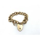 Gold curb and padlock bracelet