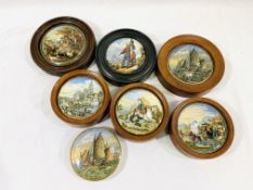 A collection of ceramic pot lids