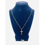 Two 9ct gold crosses