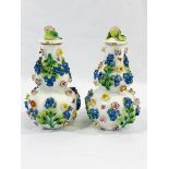 A pair of Augustus Rex porcelain vases