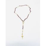 18ct gold and red bead rosary