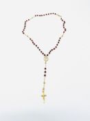 18ct gold and red bead rosary