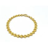 Gold link bracelet marked 917 (22ct)