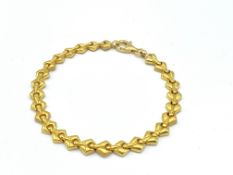 Gold link bracelet marked 917 (22ct)