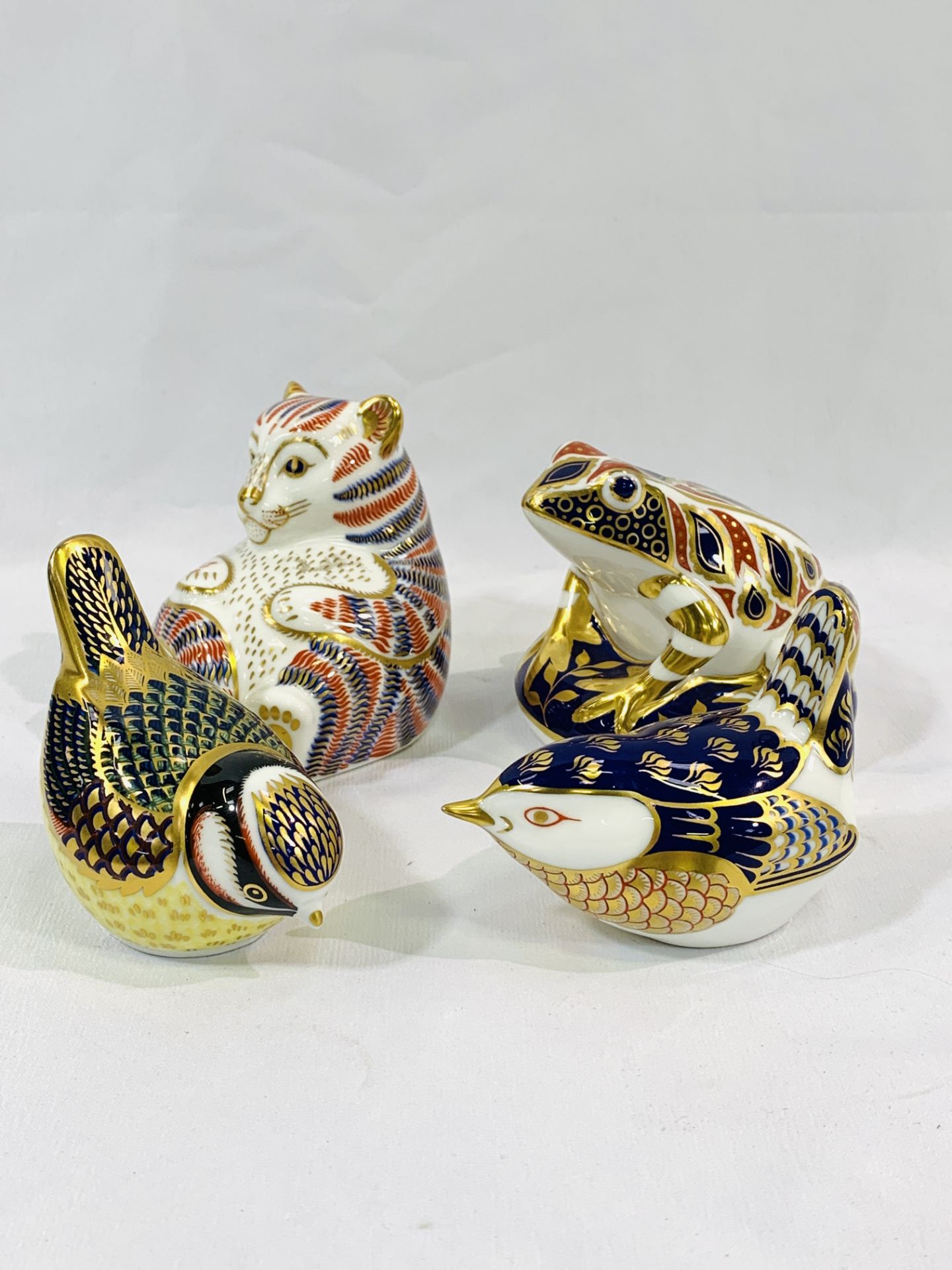 Four Royal Crown Derby paperweights