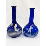 Two blue cameo glass bottles