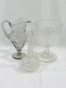 A cut glass chalice and water jug