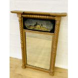 Gilt columned framed overmantle mirror.