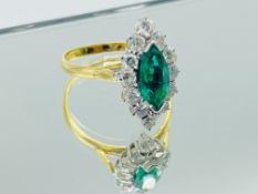 18ct Gold and platinum set emerald and diamond dress ring
