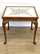 Mahogany framed side table with glazed embroidered panel to top