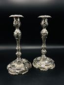 A pair of rococo silver candlesticks, by Henry Wilkinson & Co, Sheffield 1875