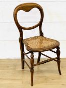 Mahogany balloon back dining chair with cane seat