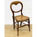 Mahogany balloon back dining chair with cane seat