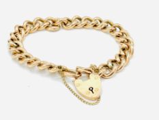 Gold curb and padlock bracelet