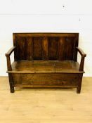 Oak settle with panel back