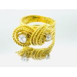 Gold rope twist ring set with diamonds