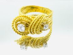 Gold rope twist ring set with diamonds