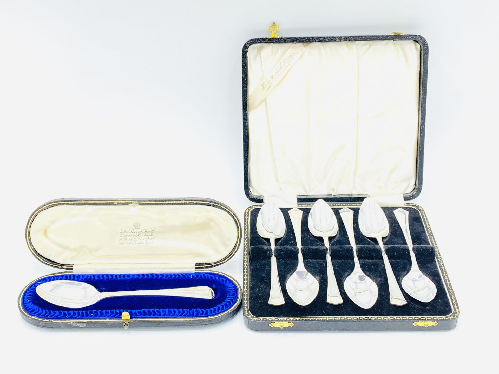 Boxed set of six silver grapefruit spoons, Sheffield 1937, and a boxed silver spoon, London 1907