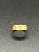 18ct gold three diamond ring