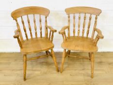 Two pine Windsor open armchairs