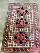 A red ground rug and a runner