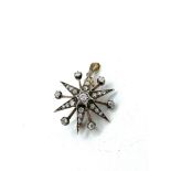 Gold and platinum diamond set star shaped pendant cum brooch