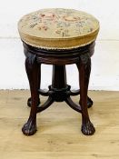 Adjustable stool with tapestry seat