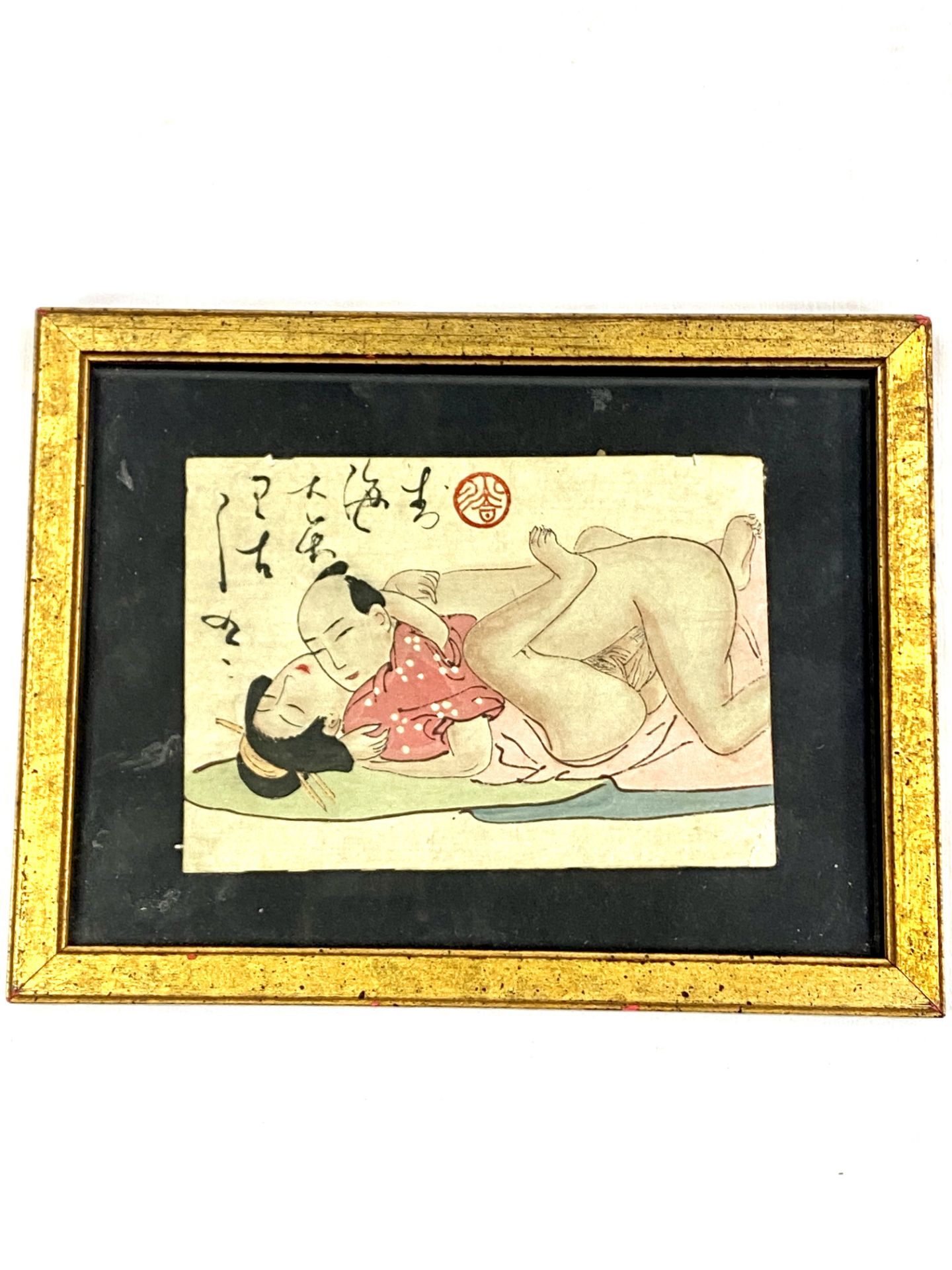 Framed and glazed erotic print