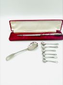 Small berry spoon hallmarked London 1833, and other silver items