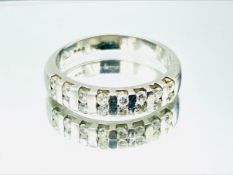 Diamond and platinum half eternity ring