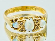 Opal and 18ct gold ring
