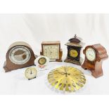 Four wood cased mantel clocks