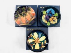 Three boxed Moorcroft coasters