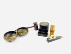 A wooden gavel and other items