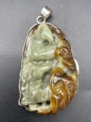 Silver mounted carved jade pendant