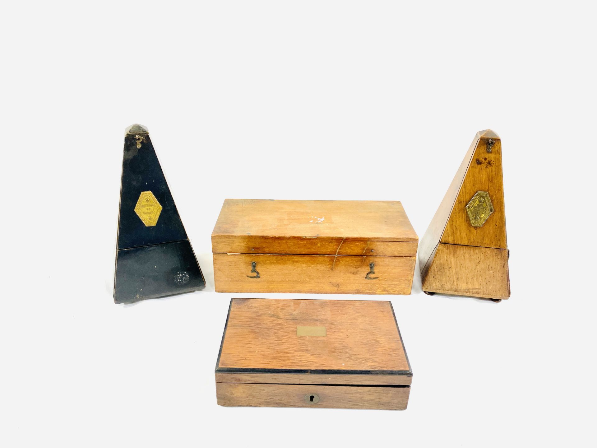 Two metronomes, a microscope and a box of drawing instruments
