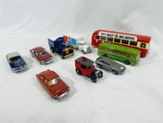 A collection of diecast toy cars and vans