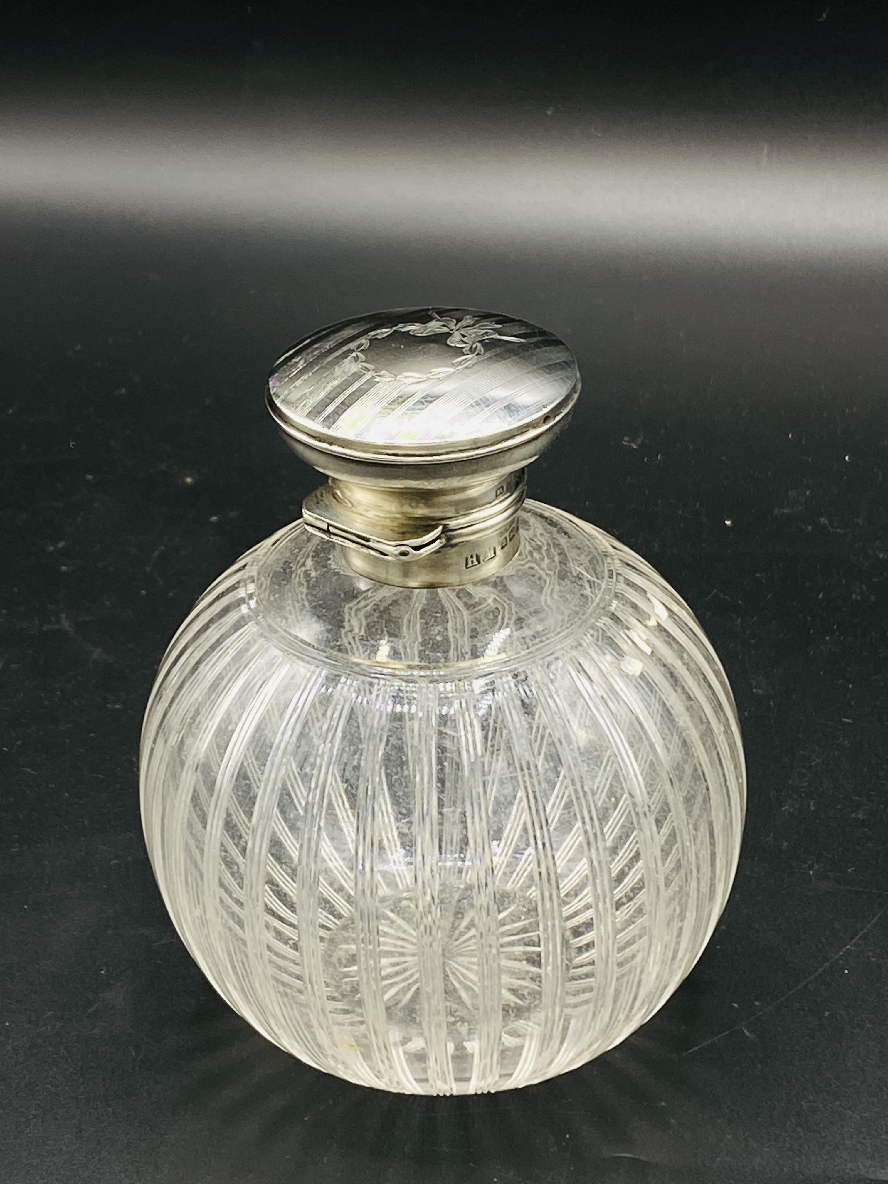Early 20th century cut glass toilet water bottle with silver top - Image 2 of 4