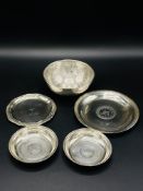 Egyptian silver bowl, three silver dishes and a German silver dish