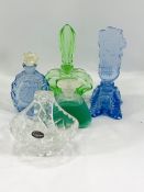 Four glass perfume bottles