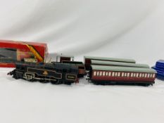 Three Hornby Meccano 00 gauge tinplate carriages, three wagons and accessories