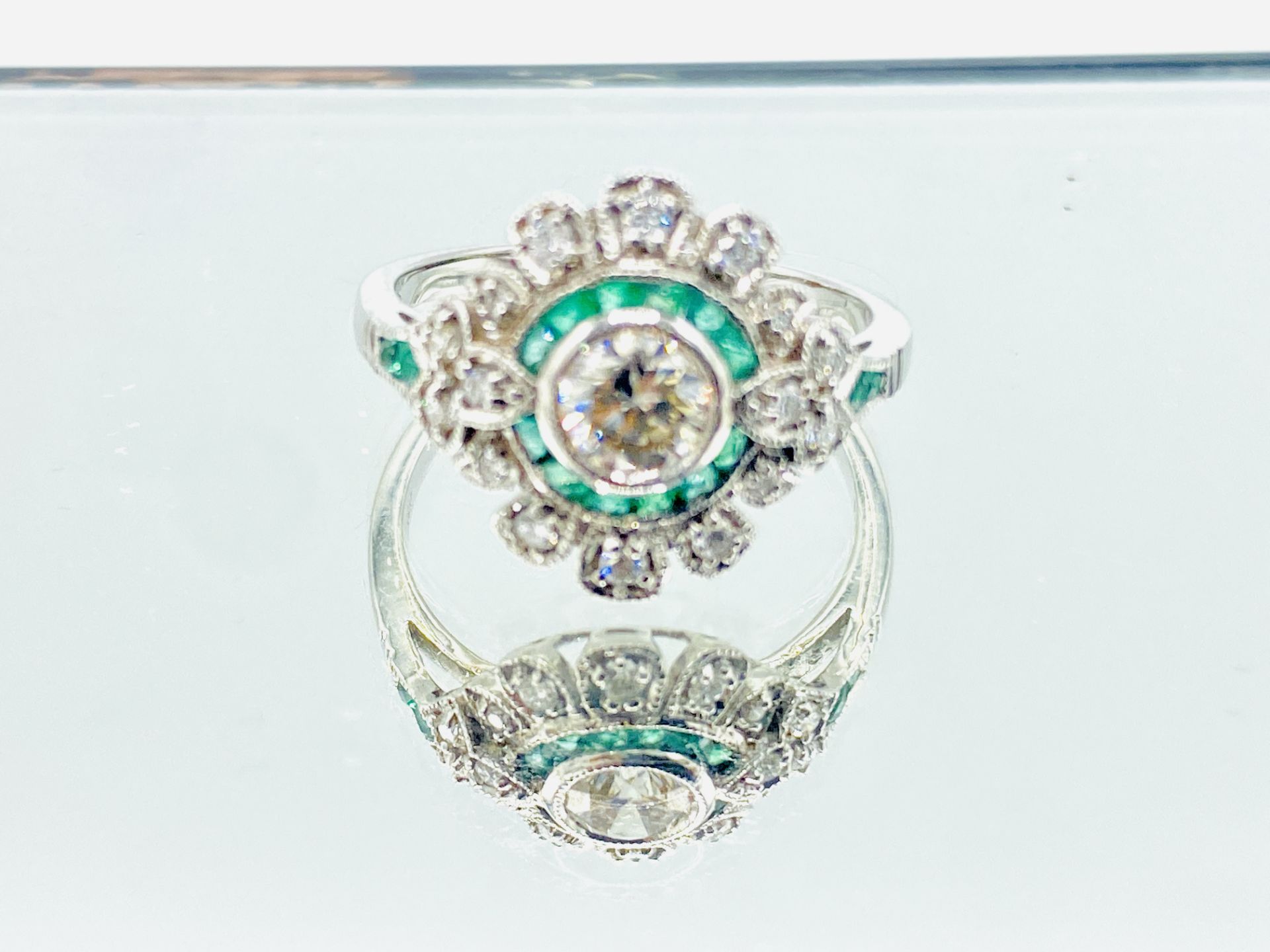 18ct white gold, emerald and diamond ring