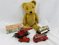 A boxed tinplate boat, a Dinky fire engine and two 0 gauge items