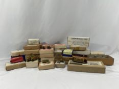 A collection of die cast miniature model kits