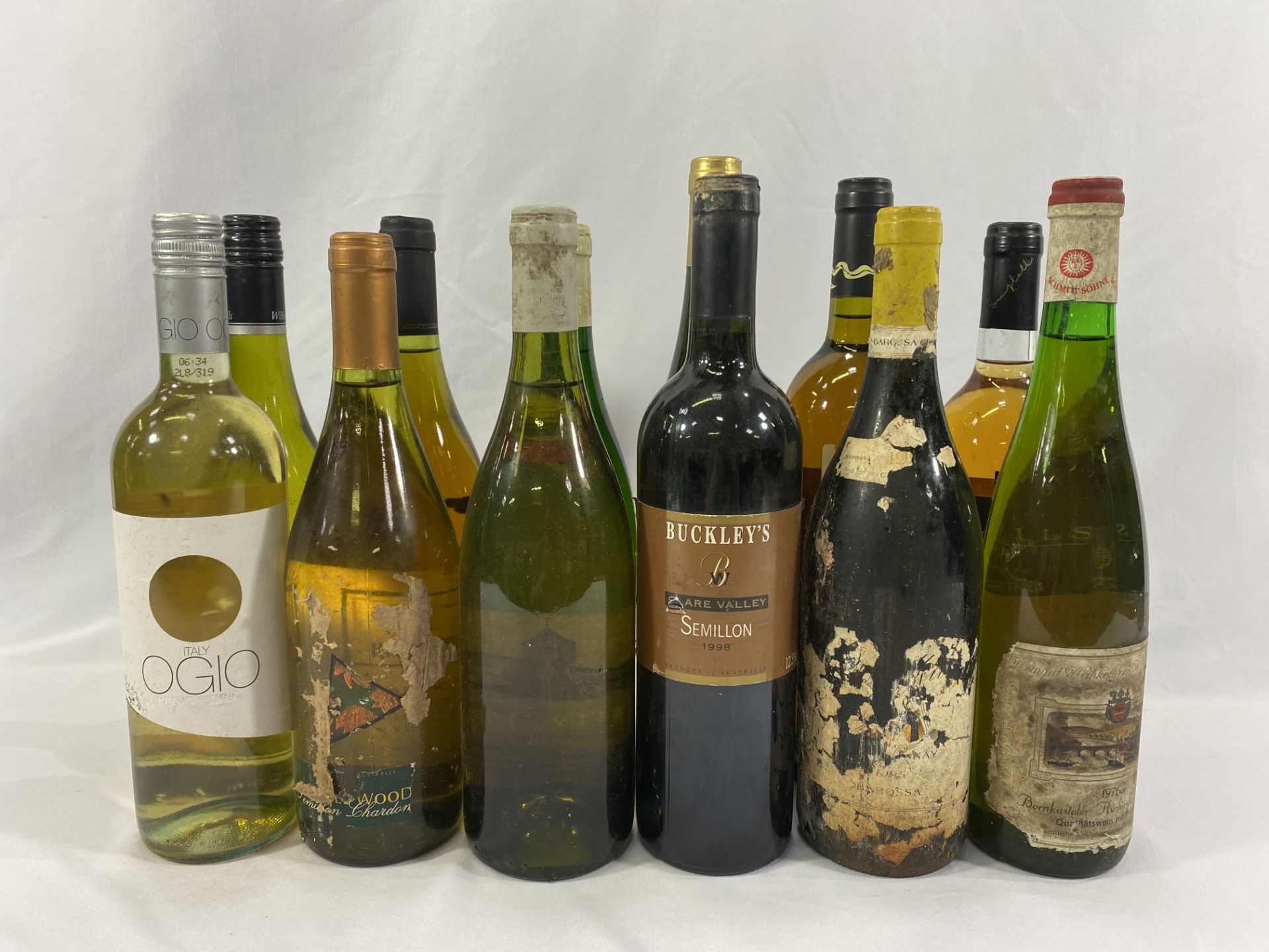 Eleven bottles of white wine